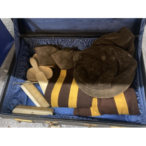 172 - A VINTAGE SUITCASE CONTAINING VINTAGE BRUSHES WITH MONOGRAMS, CAPS, SCARVES, ETC