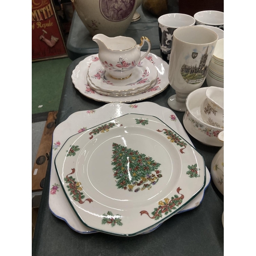 210 - A LARGE QUANTITY OF MUGS, CUPS AND PLATES TO INCLUDE A JOHNSON BROS CHRISTMAS PLATE