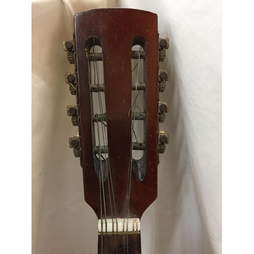 225 - A VINTAGE INLAID MANDOLIN WITH A PLECTRUM