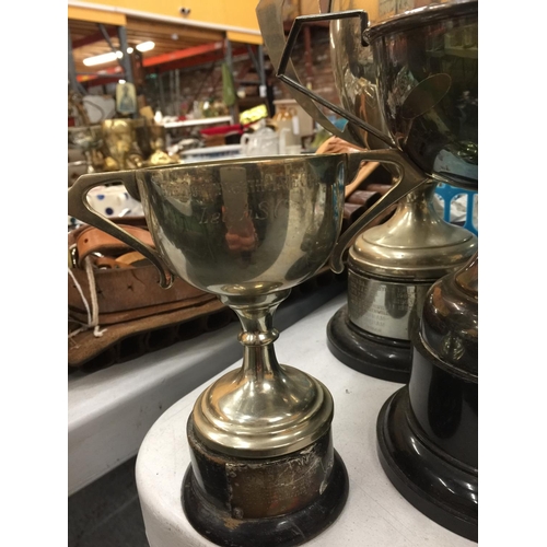 234 - FIVE SILVER PLATED TROPHY CUPS TO INCLUDE FOR LEIGH SC