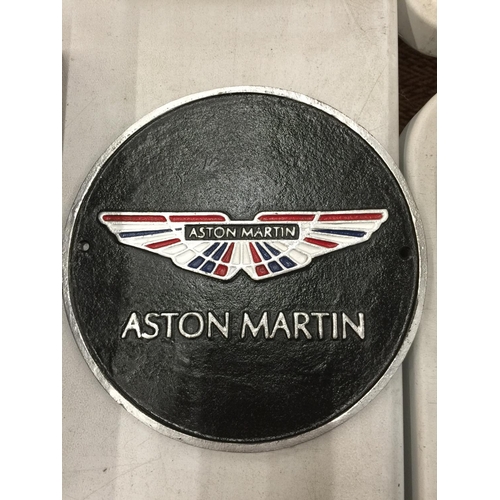 238 - A CAST ASTON MARTIN SIGN DIAMETER 24CM