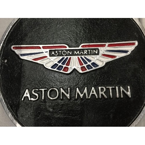 238 - A CAST ASTON MARTIN SIGN DIAMETER 24CM