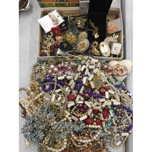 246 - A LARGE QUANTITY OF COSTUME JEWELLERY TO INCLUDE BROOCHES, NECKLACES, EARRINGS, BANGLES, BEADS, ETC