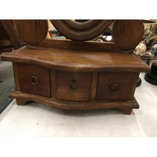 249 - A DRESSING TABLE MIRROR WITH HARDWOOD SURROUND, SERPENTINE FRONT AND THREE DRAWERS, HEIGHT APPROX 52... 