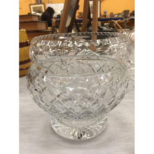 261 - A LARGE CUT GLASS CRYSTAL FOOTED BOWL AND A SMALLER BOWL