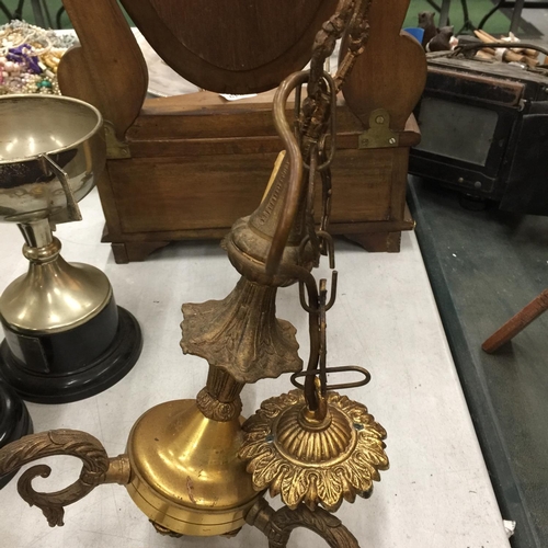 272 - AN ORNATE BRASS CEILING LAMP WITH THREE CANDLE BRANCHES PLUS A MATCHING PAIR OF WALL LIGHTS