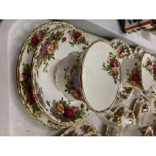 287 - A QUANTITY OF ROYAL ALBERT 'COLD COUNTRY ROSES' TO INCLUDE CUPS, SAUCERS, SIDE PLATES, A CREAM JUG, ... 