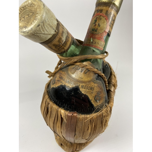 400A - A RARE 1947 CHIANTI TWIN RED / WHITE WINE BOTTLE IN BAMBOO HOLDER