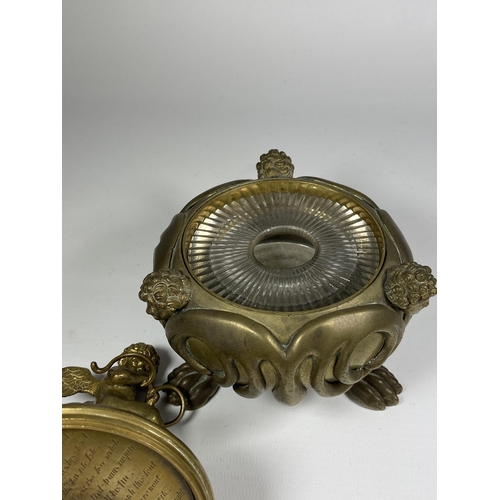 95 - A 19TH CENTURY BRASS PETRARCH'S INKSTAND WITH CHERUB DESIGN, INSRIBED TO UNDERISDE OF LID