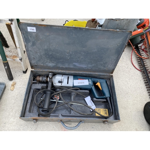 1765 - A BOSCH ELECTRIC SDS DRILL AND CARRY CASE