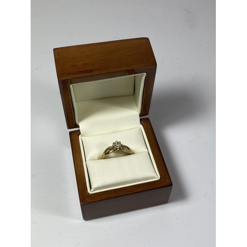 52 - A 9CT YELLOW GOLD ILLUSION SET DIAMOND RING WITH CHIP DIAMOND SHOULDERS, SIZE N/O, BOXED