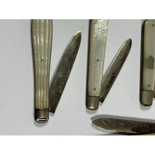 56 - A SET OF SEVEN HALLMARKED SILVER AND MOTHER OF PEARL FRUIT KNIVES