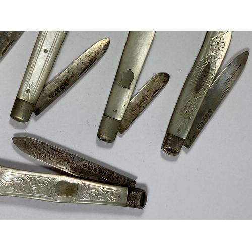 56 - A SET OF SEVEN HALLMARKED SILVER AND MOTHER OF PEARL FRUIT KNIVES