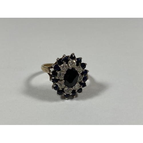 65 - A 9CT YELLOW GOLD SAPPHIRE & CZ CLUSTER RING, WEIGHT 3.9G