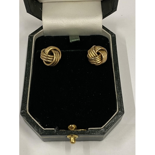 11 - A BOXED PAIR OF 9CT YELLOW GOLD KNOT DESIGN EARRINGS, WEIGHT 3.67G