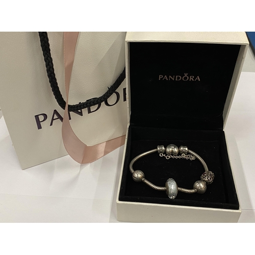 2 - A SILVER BOXED PANDORA CHARM BRACELET WITH BAG