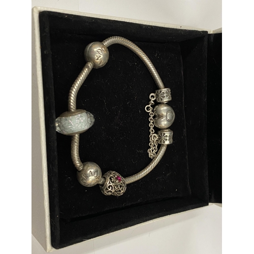 2 - A SILVER BOXED PANDORA CHARM BRACELET WITH BAG