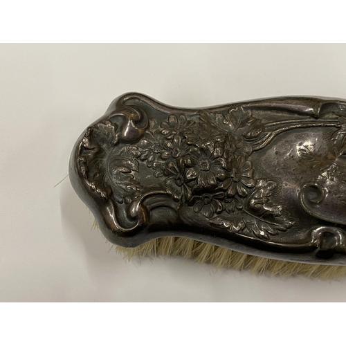 23 - AN ORNATE SILVER ART NOUVEAU STYLE CLOTHES BRUSH