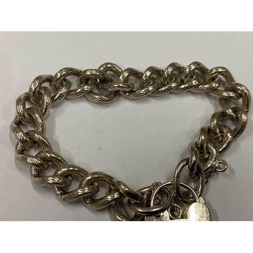 31 - A VINTAGE HEAVY LINK SILVER BRACELET