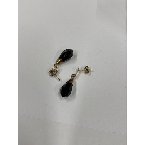 4 - A BOXED PAIR OF 9CT YELLOW GOLD EARRINGS WITH BLACK STONE DESIGN