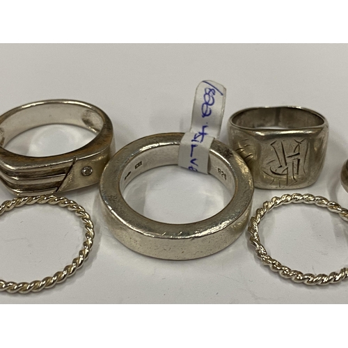 40 - SIX ASSORTED SILVER RINGS