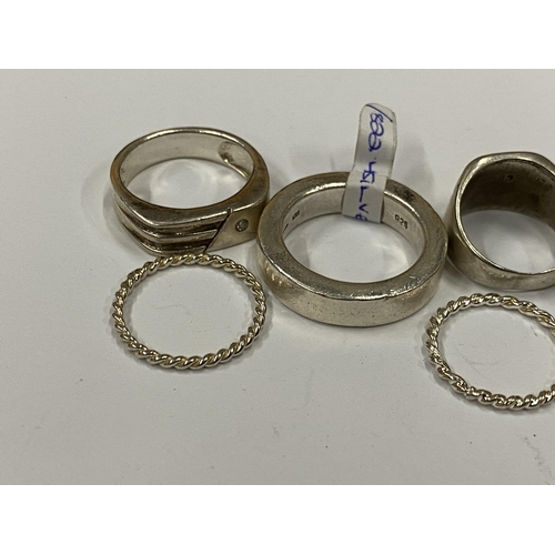 40 - SIX ASSORTED SILVER RINGS