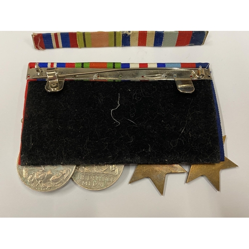 49 - FOUR W.W.II MEDALS TO INCLUDE 1939-1945 STAR AND FRANCE AND GERMANY STAR