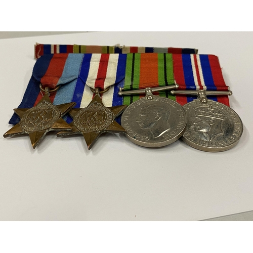 49 - FOUR W.W.II MEDALS TO INCLUDE 1939-1945 STAR AND FRANCE AND GERMANY STAR