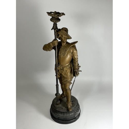 16 - A LARGE SPELTER LAMP BASE MODELLED AS A SWORDSMAN, HEIGHT 59CM