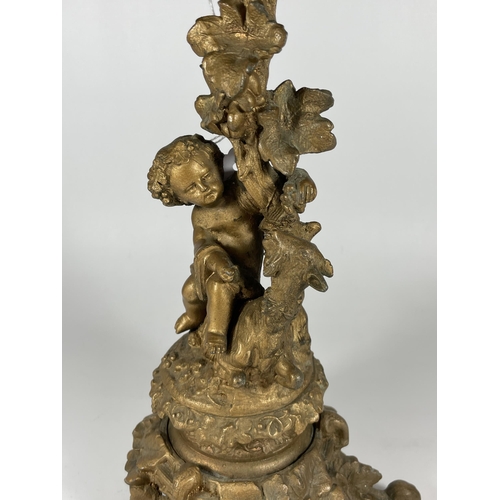 22 - A GILT CHERUB DESIGN LAMP BASE, HEIGHT 33CM