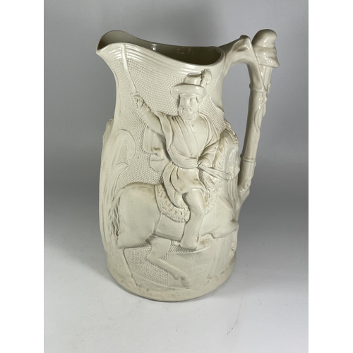 23 - A LARGE PARIAN STYLE POTTERY JUG OF A MAN ON HORSEBACK, HEIGHT 31CM