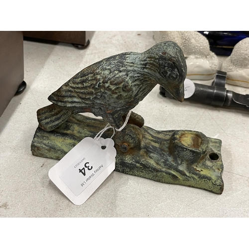 34 - A CAST METAL WOODPECKER DOOR KNOCKER MODEL