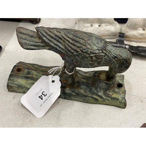 34 - A CAST METAL WOODPECKER DOOR KNOCKER MODEL