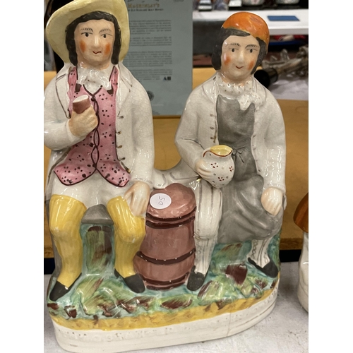 40 - A PAIR OF LARGE STAFFORDSHIRE POTTERY FIGURES