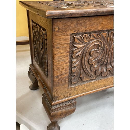 72 - A CARVED OAK DESIGN LIDDED STORAGE BOX