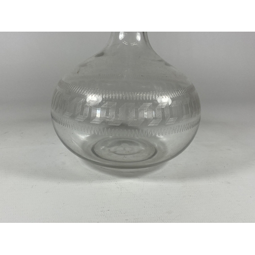 83 - AN EARLY 19TH CENTURY GLASS DECANTER WITH ETCHED GREEK KEY DESIGN, HEIGHT 29CM