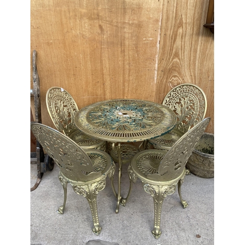 1216 - A VINTAGE STYLE CAST ALLOY BISTRO SET COMPRISING OF A ROUND TABLE AND FOUR CHAIRS