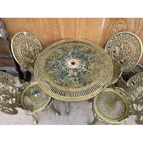 1216 - A VINTAGE STYLE CAST ALLOY BISTRO SET COMPRISING OF A ROUND TABLE AND FOUR CHAIRS