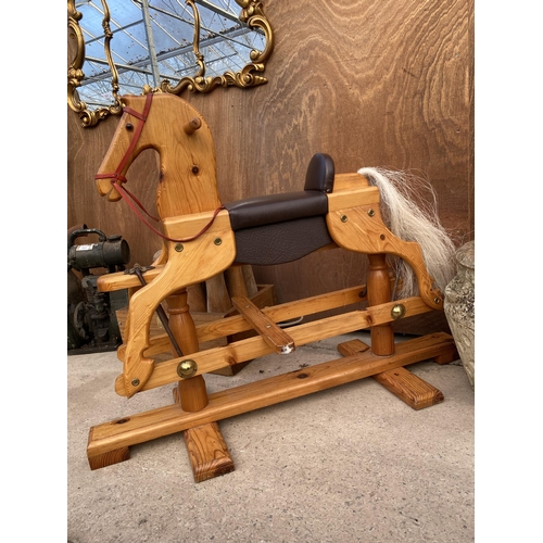 1220 - A WOODEN CHILDRENS ROCKING HORSE