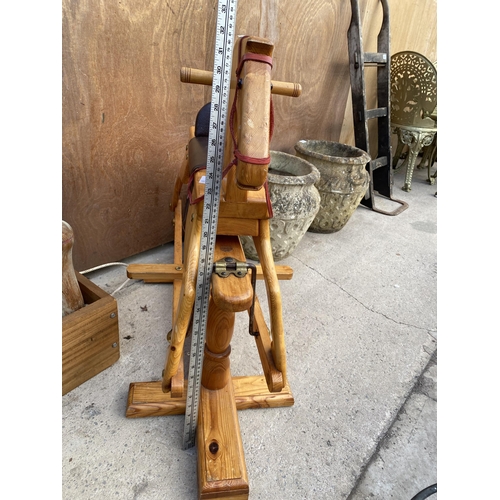 1220 - A WOODEN CHILDRENS ROCKING HORSE