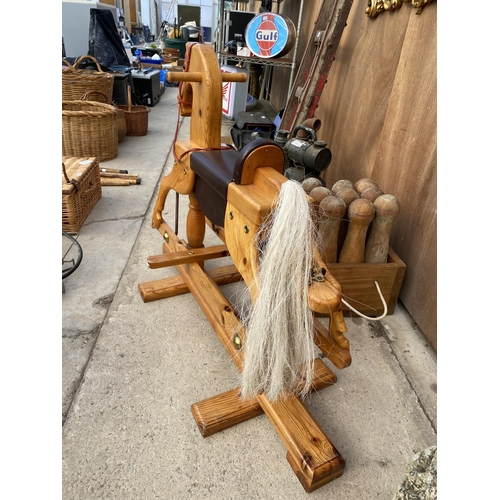 1220 - A WOODEN CHILDRENS ROCKING HORSE