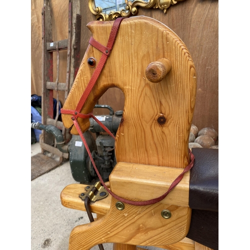 1220 - A WOODEN CHILDRENS ROCKING HORSE