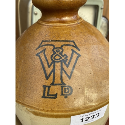 1233 - TWO STONE WARE FLAGGONS CONVERTED INTO TABLE LAMPS TO INCLUDE ONE BEARING THE STAMP T&W LTD