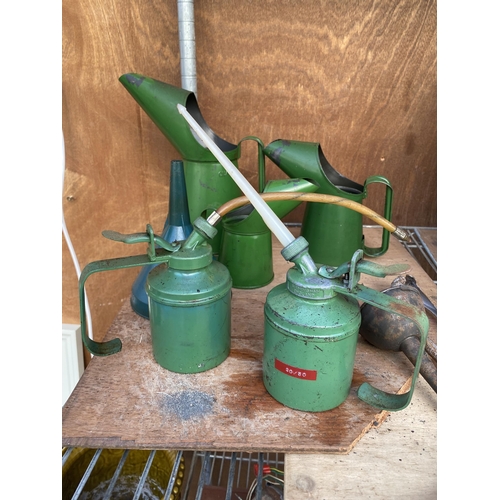 1234 - AN ASSORTMENT OF ITEMS TO INBCLUDE A GRADUATED SET OF GREEN OIL JUGS, A WESCO PUMP ACTION OIL CAN AN... 