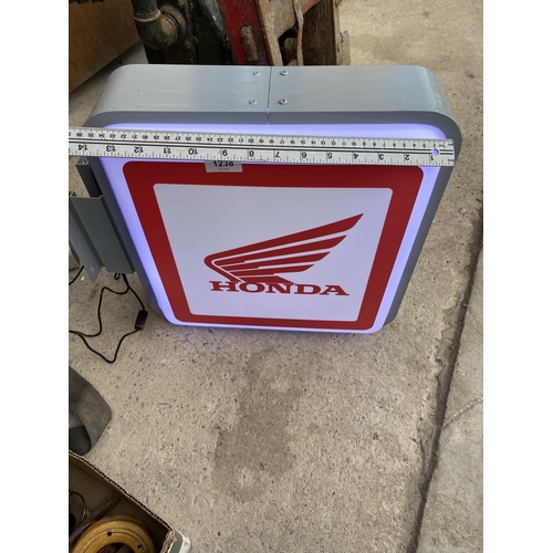 1238 - A HONDA DOUBLE SIDED ILLUMINATED LIGHT BOX SIGN - WORKING ORDER AT TIME OF CATALOGUING.  WIDTH 46CM,... 