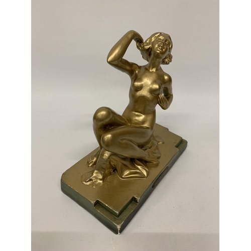 111 - A METAL ART DECO STYLE GOLD COLOURED FIGURE 'RING LADY' HEIGHT 23CM, LENGTH 24CM