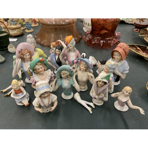 119 - A COLLECTION OF CERAMIC SEWING/PIN CUSHION LADIES