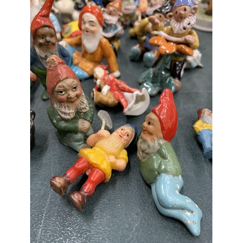 181 - A QUANTITY OF MINIATURE GNOMES TO INCLUDE METAL AND CERAMIC