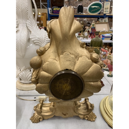 212 - A ROCCOCO STYLE GOLD COLOURED MANTLE CLOCK HEIGHT 38CM