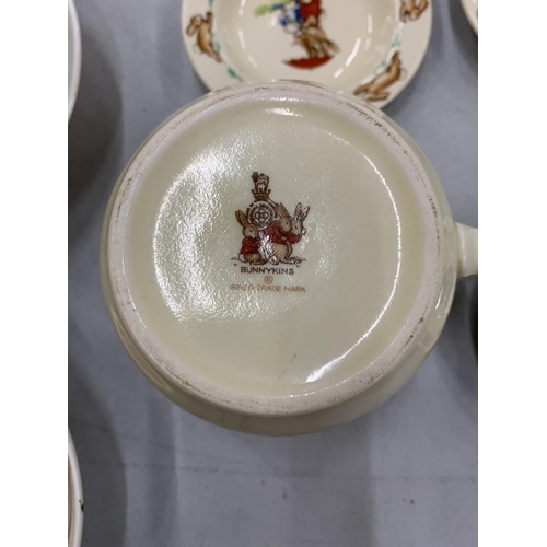 217 - A QUANTITY OF ROYAL DOULTON 'BUNNYKINS' TOINCLUDE A PLATE, MUG - A/F AND PIN DISHES PLUS A SYLVAC NU... 